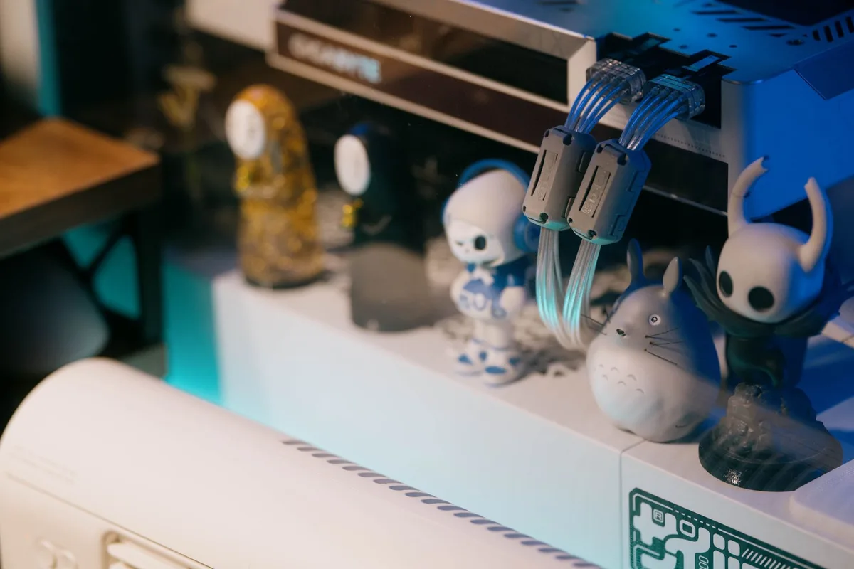 Anime figure collectibles displayed on a shelf with moody lighting, representing faceless anime content without reproducing copyrighted footage