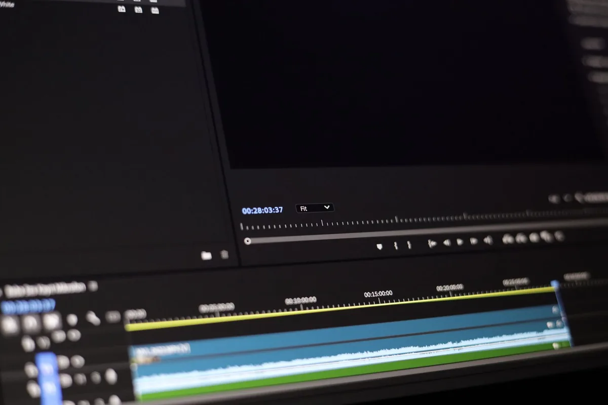 Close-up of a video editing software interface showing timeline controls and clip arrangement