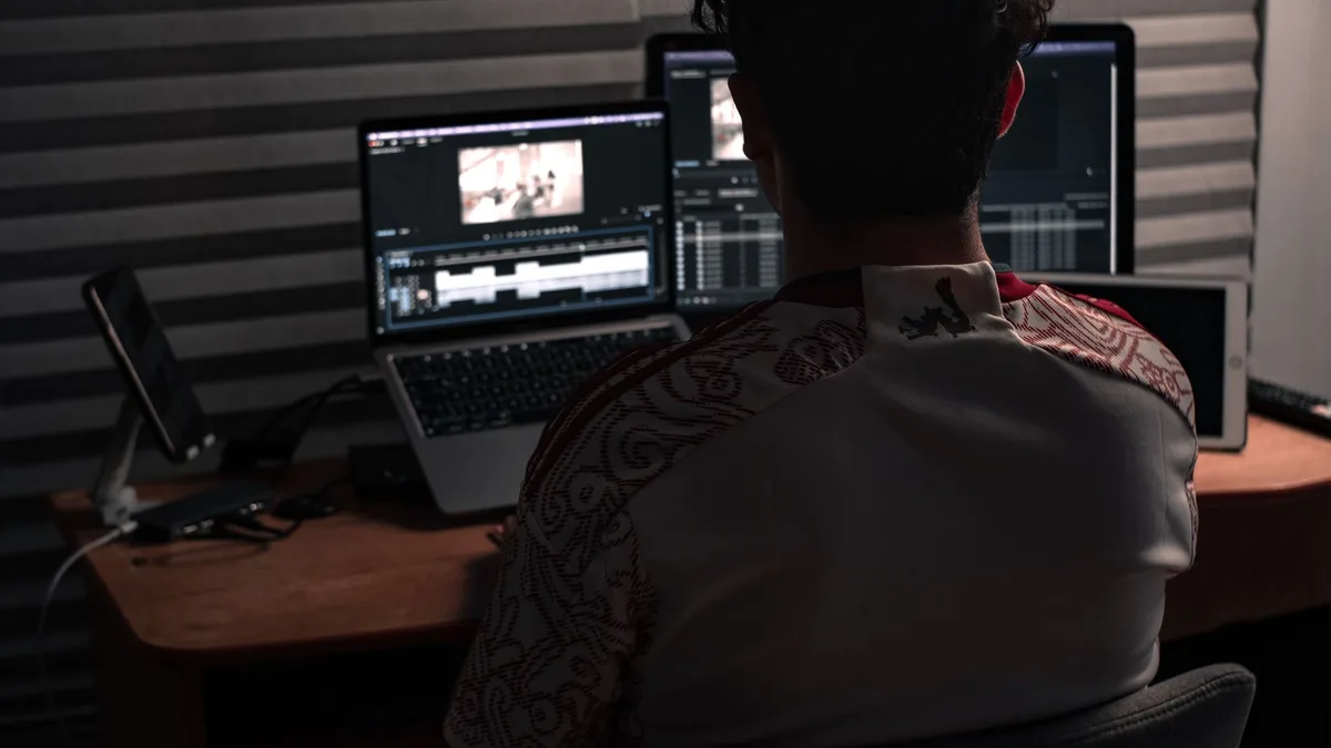 AI-assisted video editor open on a creator workstation